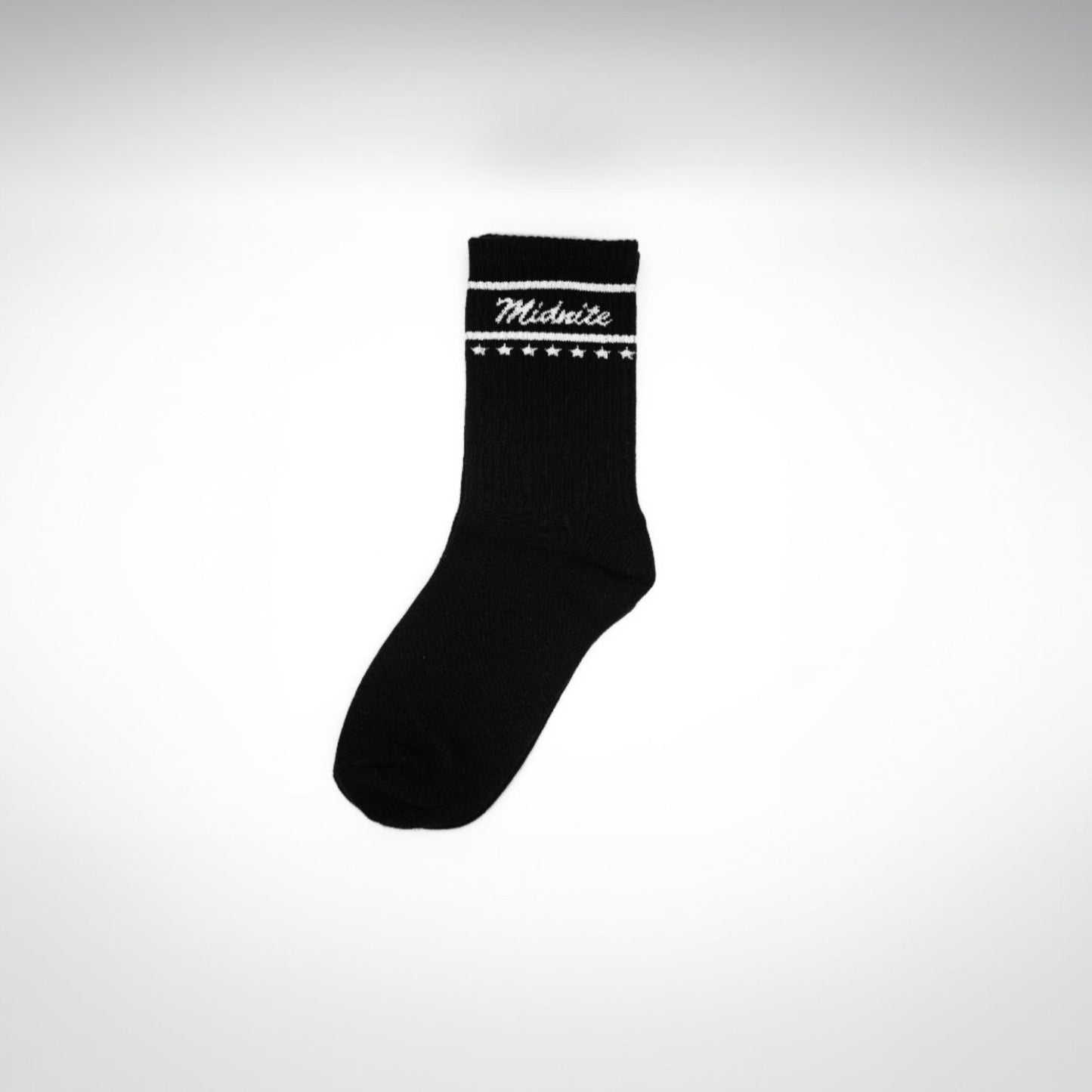 Midnite Club black streetwear socks – athletic crew style with white embroidered script logo and star band, designed for comfort and motorsport-inspired fashion.