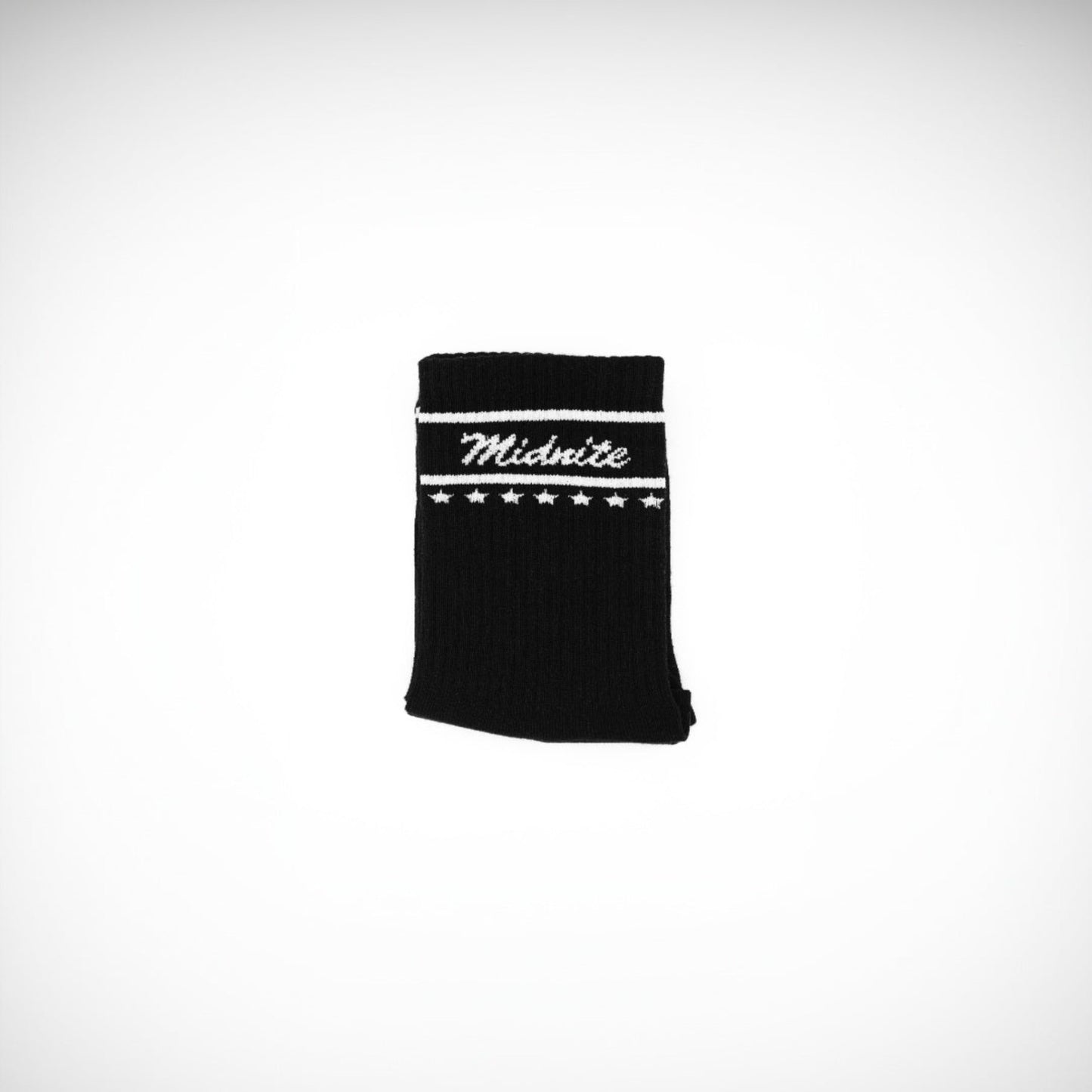 Midnite Club black streetwear socks – athletic crew style with white embroidered script logo and star band, designed for comfort and motorsport-inspired fashion.