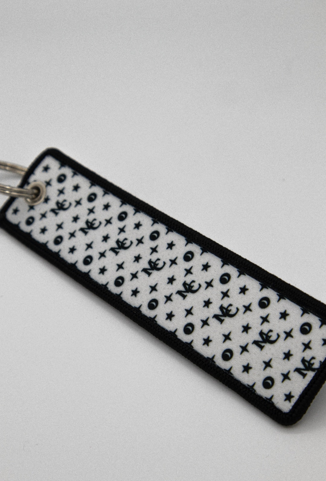Midnite MC Jet Tag Keyring – Black & White
