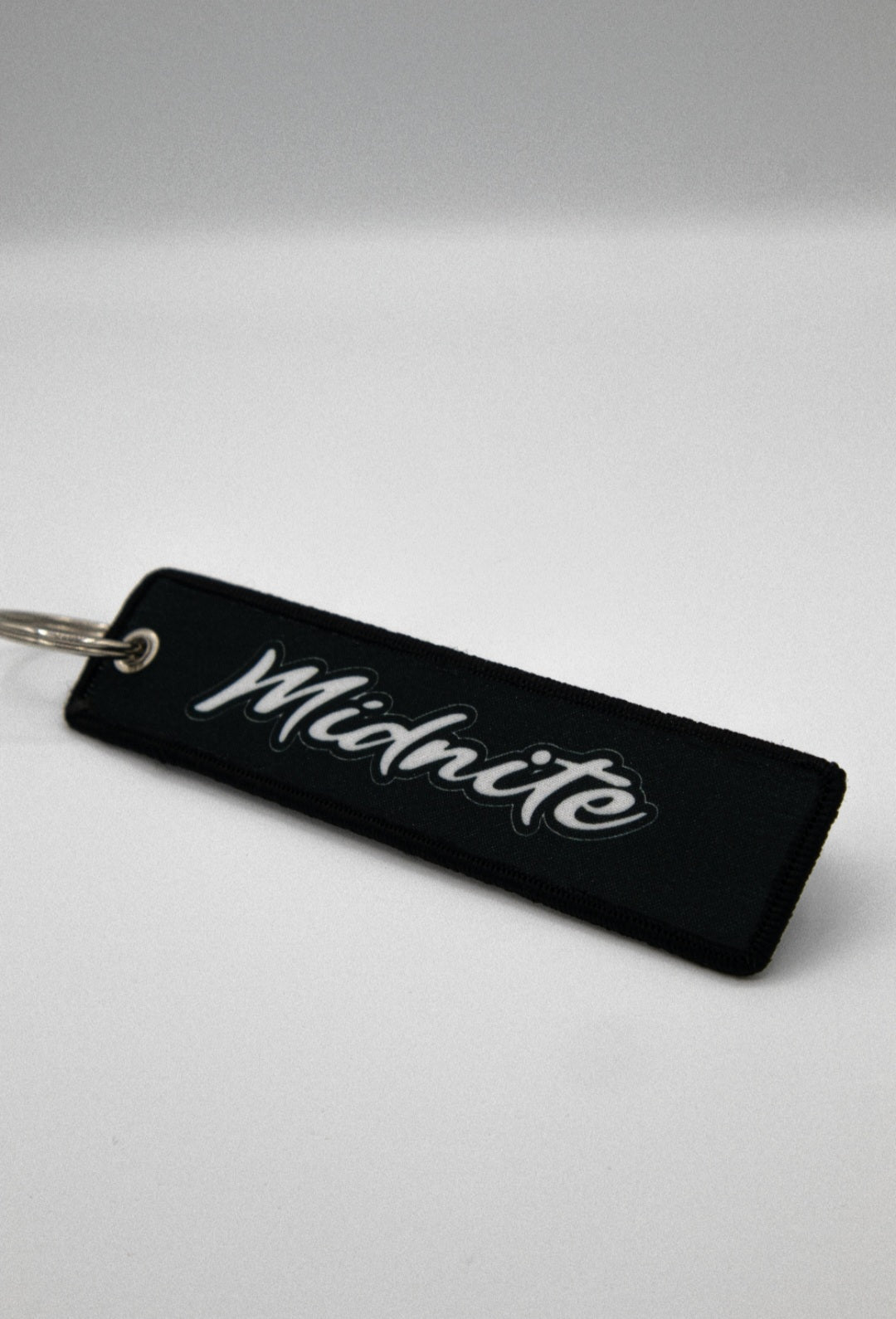 Midnite Jet Tag Keyring – Black & White vs Galaxy